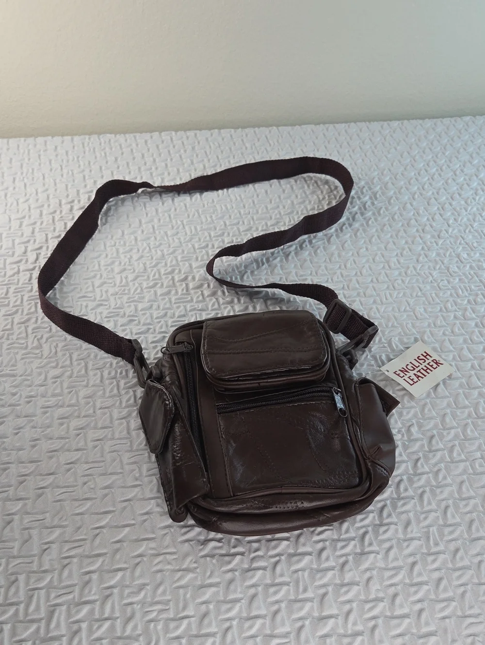 Crossbody MENS SLING BAG.Brown. English Leather PVC. RAIN RESISTANT